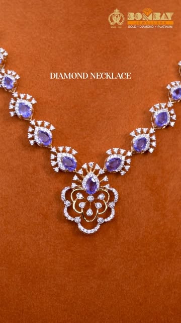 Diamond necklace with violet gemstones on display